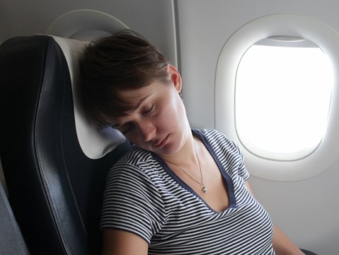 woman-sleeping-on-plane